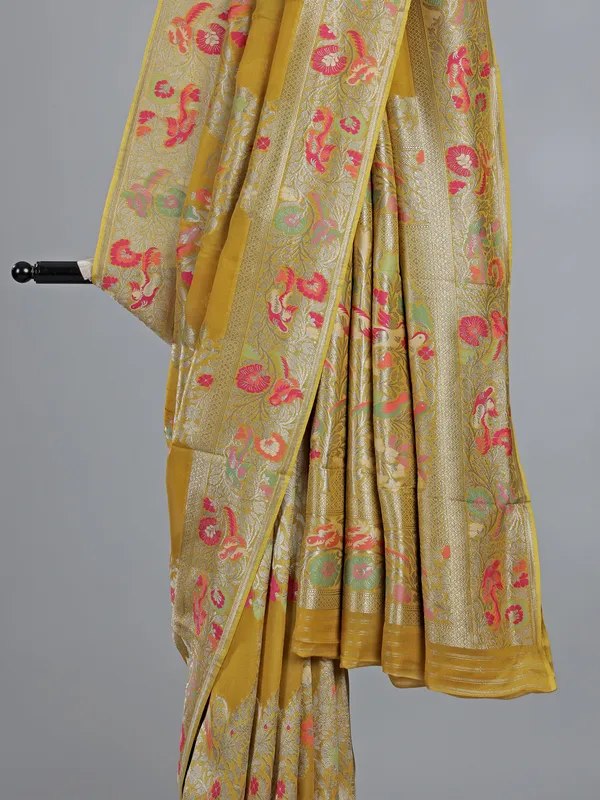 Mehendi yellow dola silk saree with colorful motifs