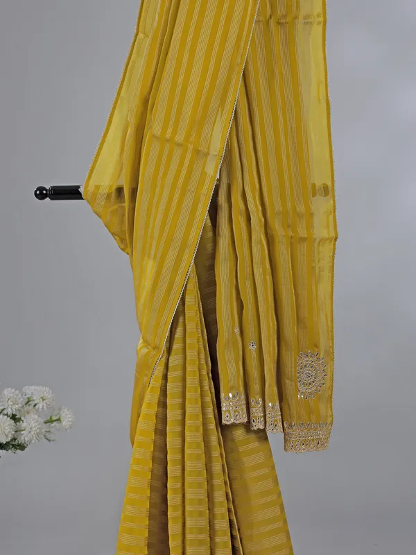 Mehendi yellow georgette saree with gota detailing