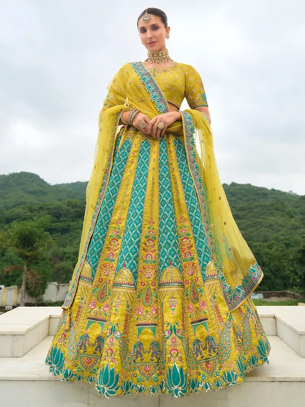Mehendi yellow silk wedding style lehenga choli
