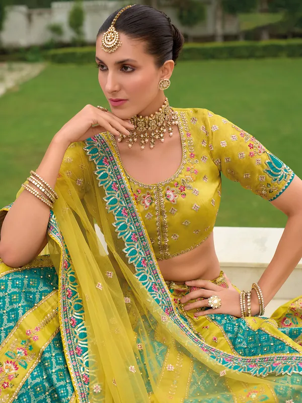 Mehendi yellow silk wedding style lehenga choli