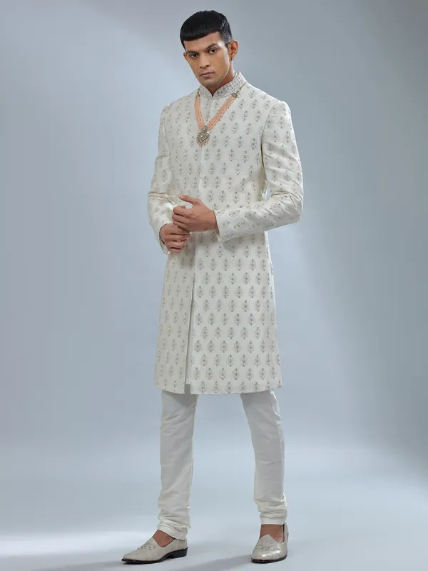 Minimalistic off white raw silk sherwani