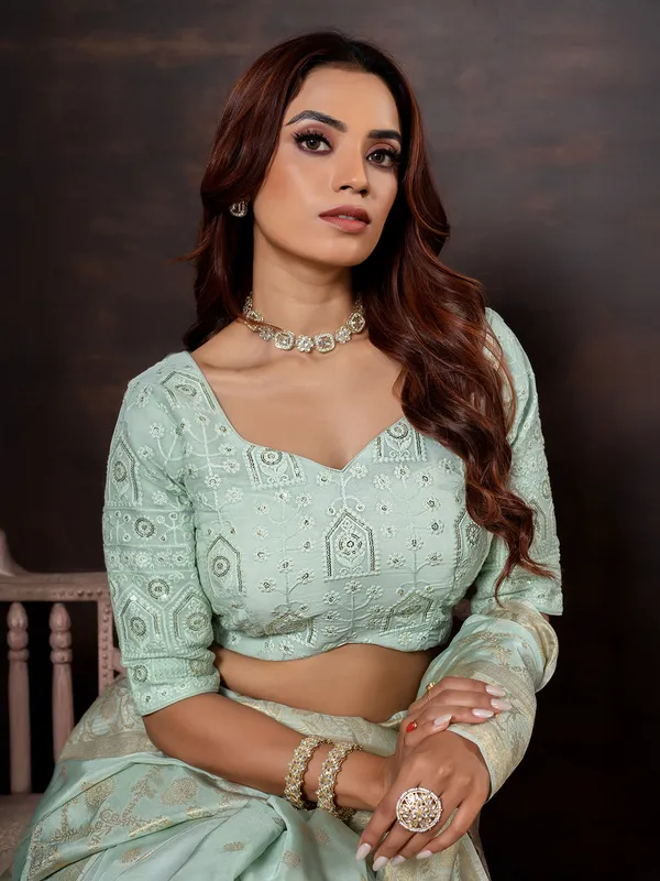 Mint blue dola silk saree with zari embellishment