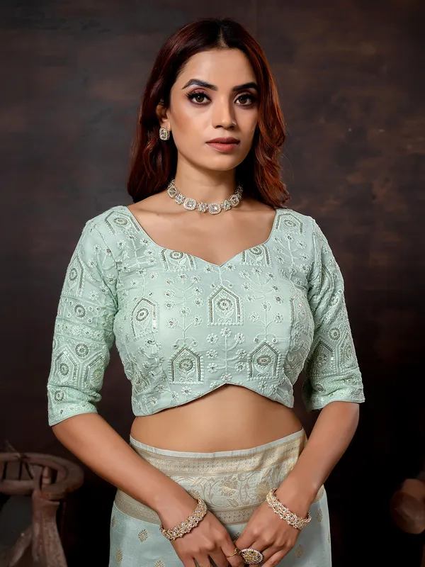 Mint blue dola silk saree with zari embellishment