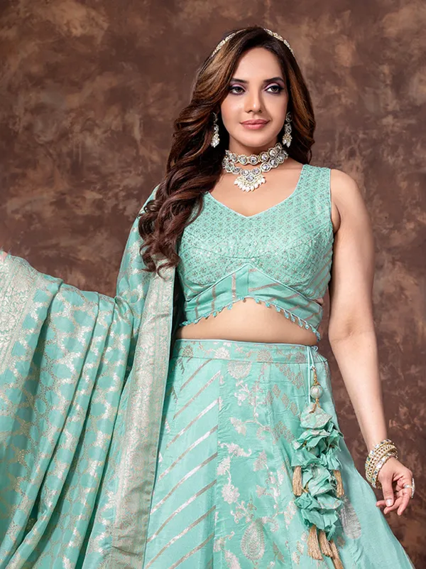 Mint blue lehenga choli in tissue silk craft