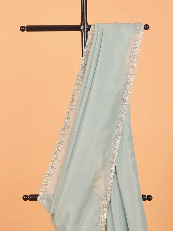Mint blue organza saree for wedding wear