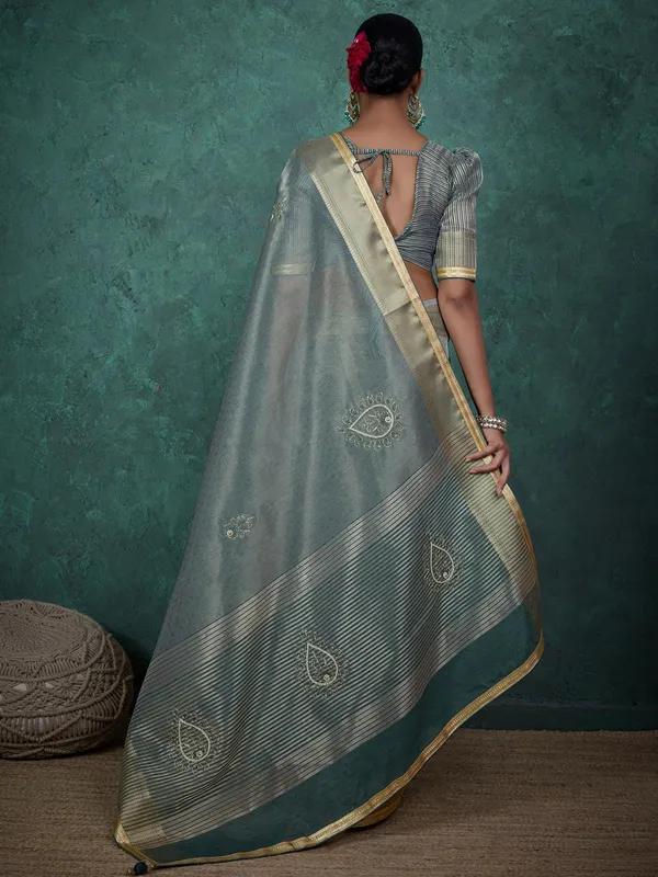 Mint blue saree in linen tissue silk