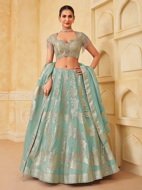 Mint blue silk lehenga choli with zari glow