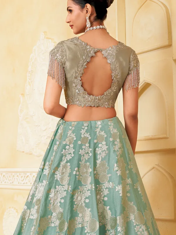 Mint blue silk lehenga choli with zari glow