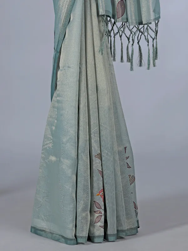 Mint blue tissue cotton silk saree with sequins and embroidery accents