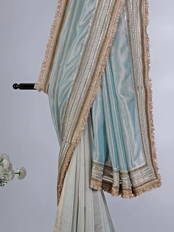 Mint blue tissue silk saree with gota accents