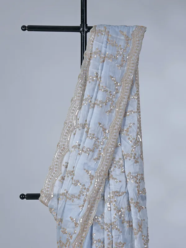 Mint blue tissue silk saree with sequins and resham work