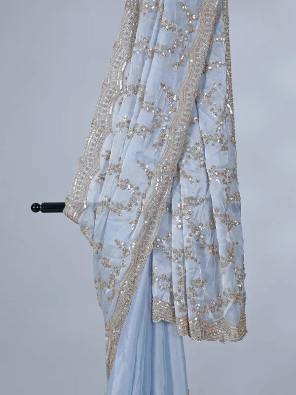 Mint blue tissue silk saree with sequins and resham work