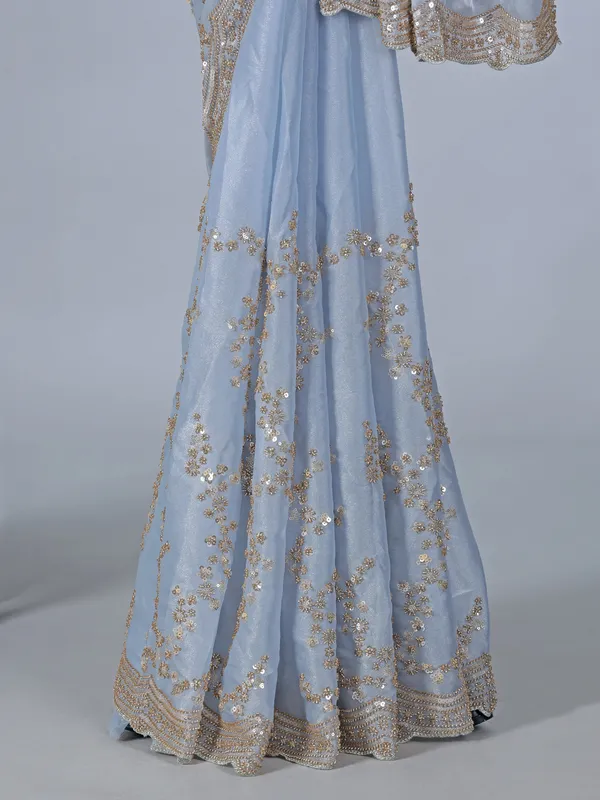 Mint blue tissue silk saree with sequins and resham work