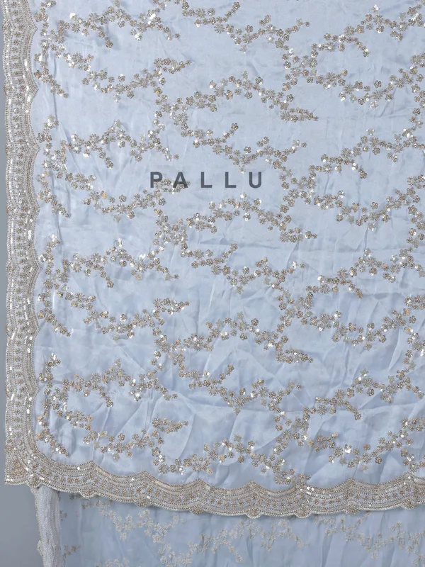 Mint blue tissue silk saree with sequins and resham work