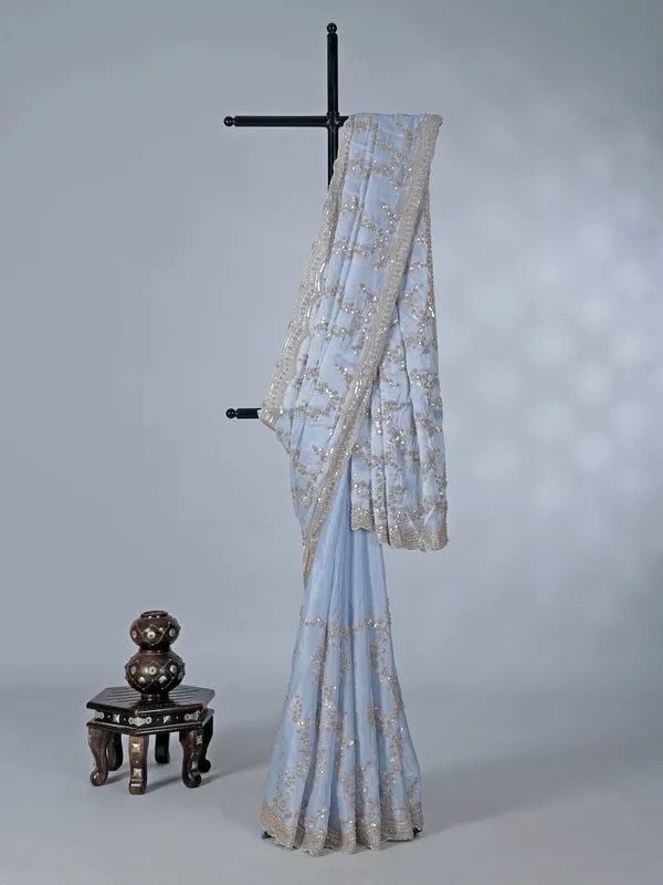 Mint blue tissue silk saree with sequins and resham work