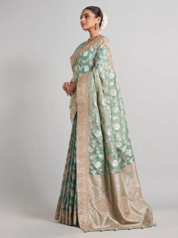 Mint green banarasi silk saree with zari weaving for weddings