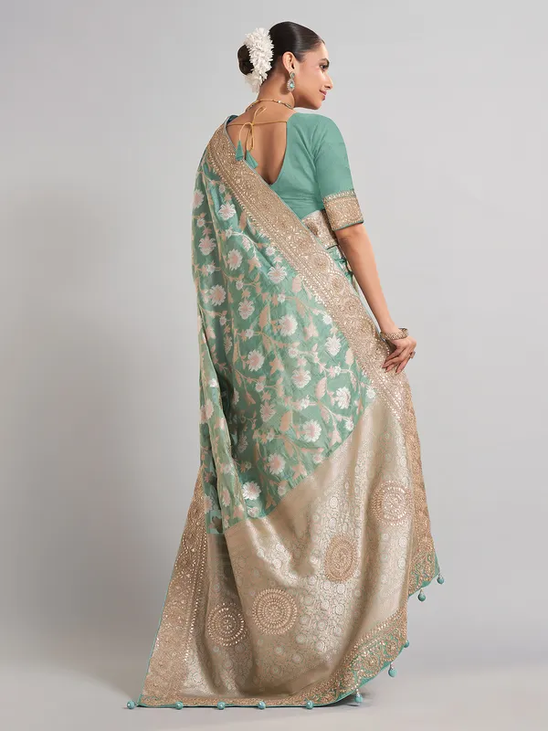 Mint green banarasi silk saree with zari weaving for weddings