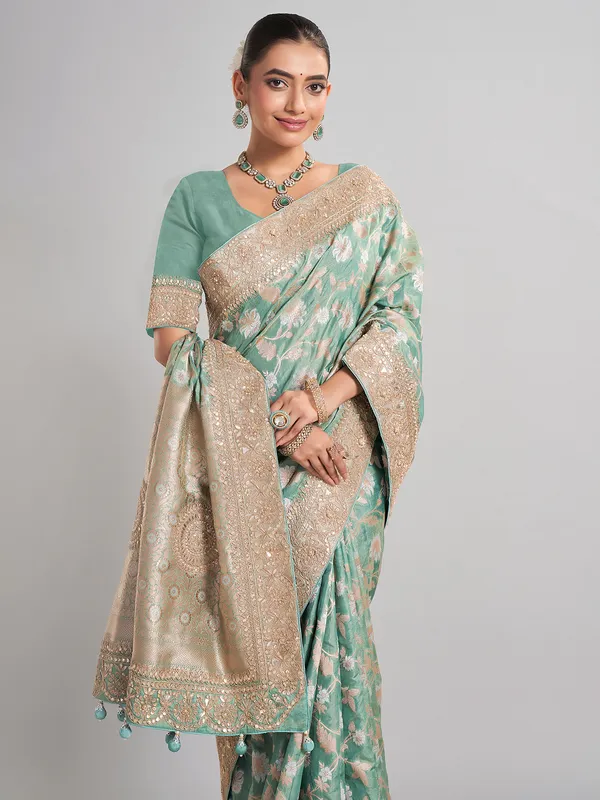 Mint green banarasi silk saree with zari weaving for weddings