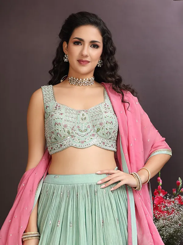 Mint green georgette lehenga choli with embellished detailing