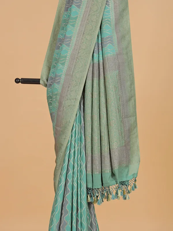 Mint green georgette zari weaving saree for women