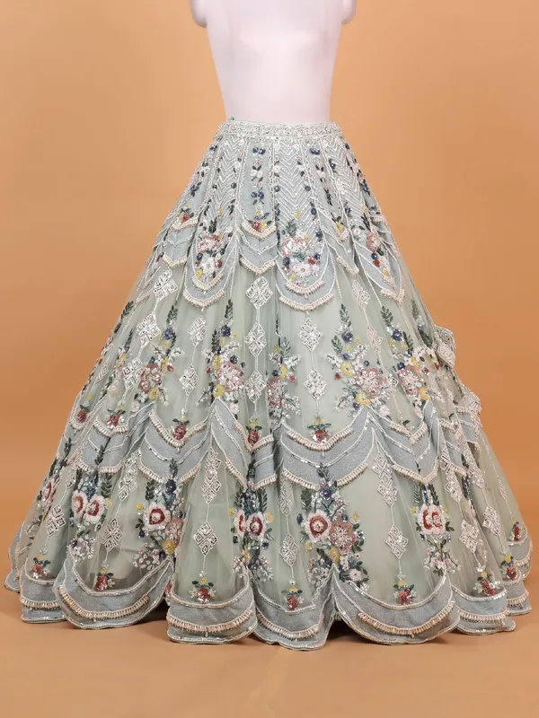Mint green net lehenga choli with heavy work