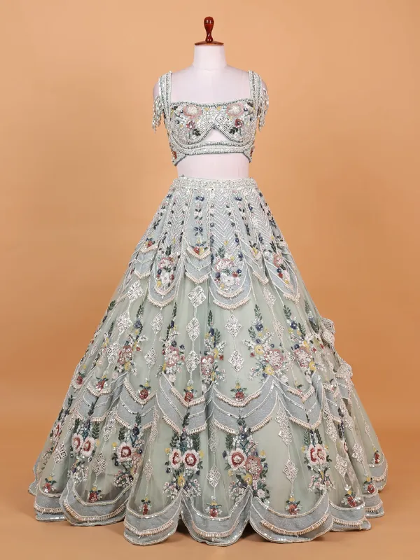 Mint green net lehenga choli with heavy work
