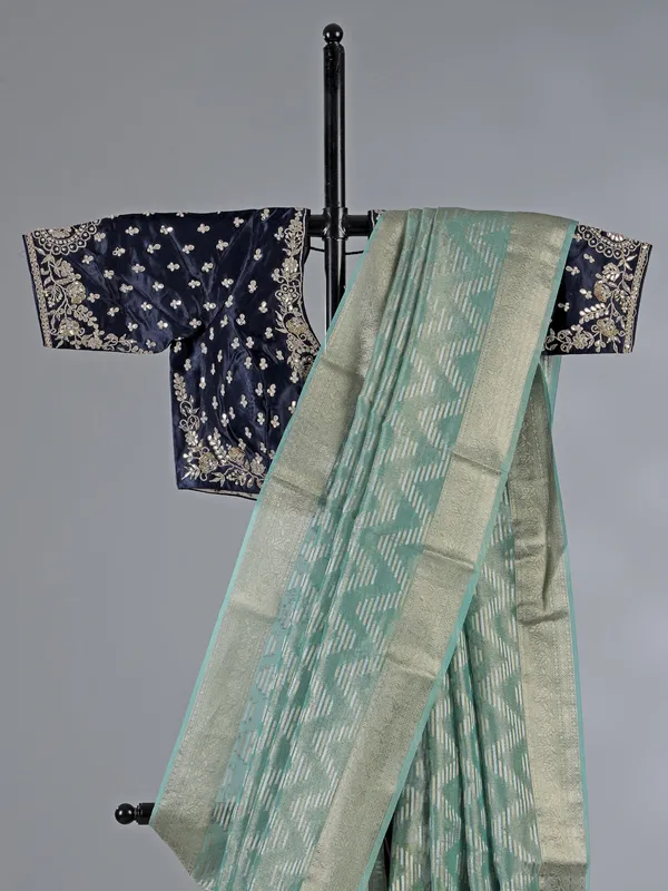 Mint green organza saree with zardosi and sequins work