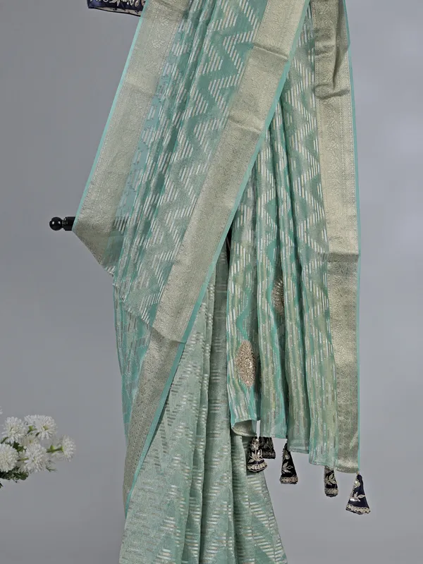 Mint green organza saree with zardosi and sequins work