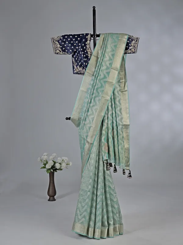 Mint green organza saree with zardosi and sequins work
