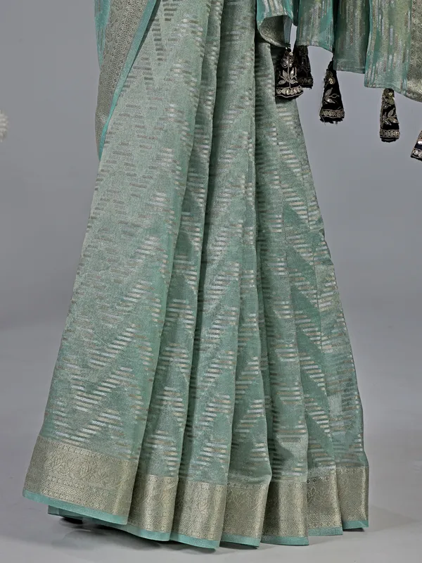 Mint green organza saree with zardosi and sequins work