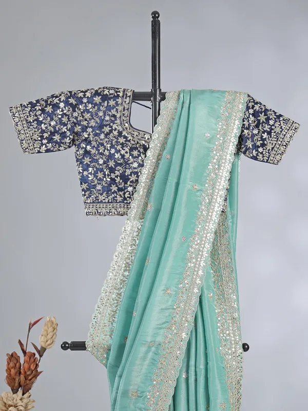Mint green silk saree with gota work