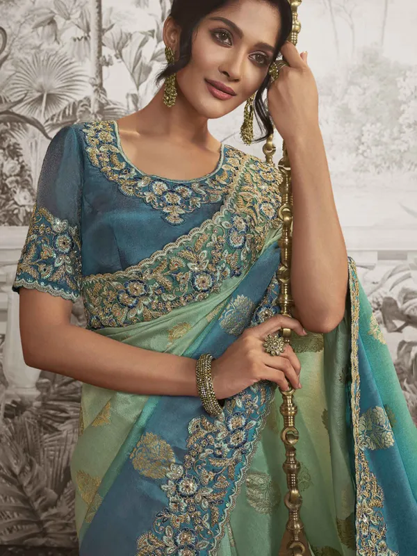 Mint green silk saree with resham work