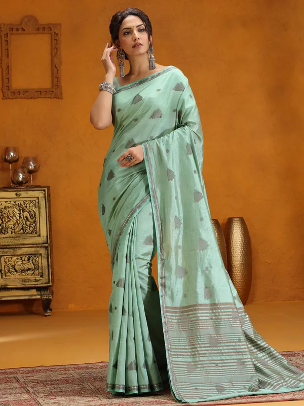 Mint green silk saree with zari weaving