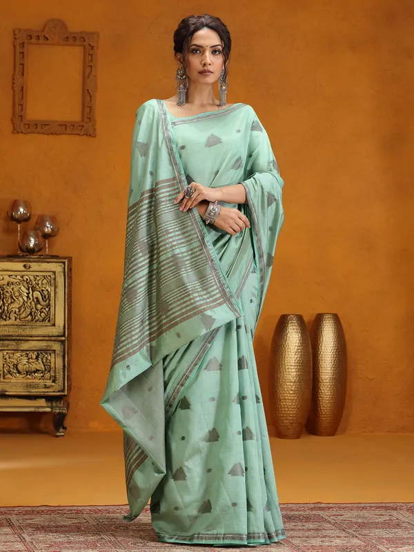 Mint green silk saree with zari weaving