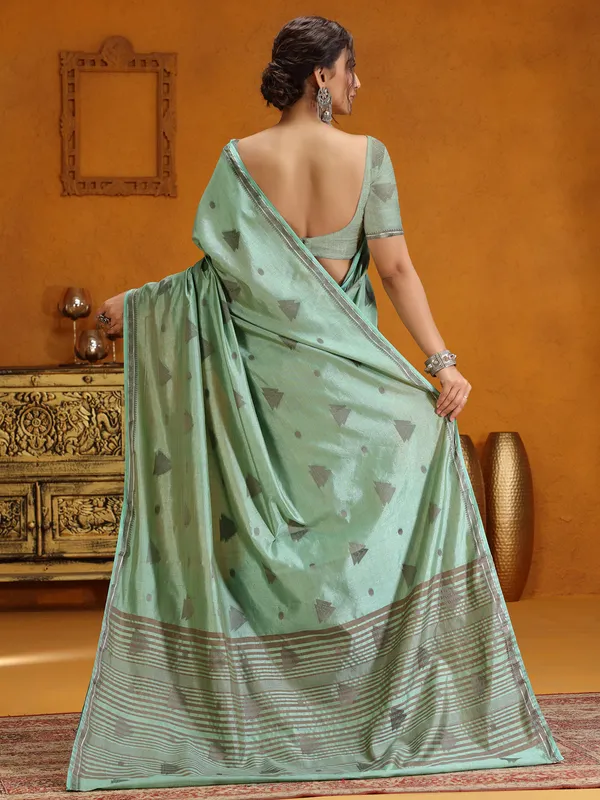 Mint green silk saree with zari weaving