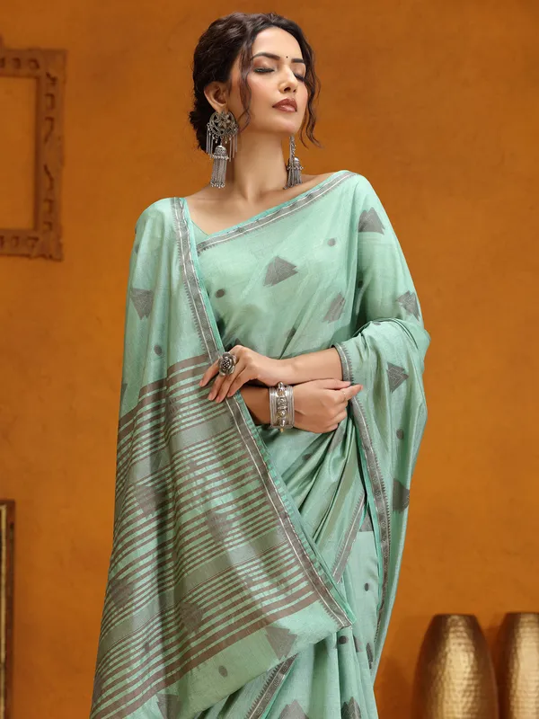 Mint green silk saree with zari weaving