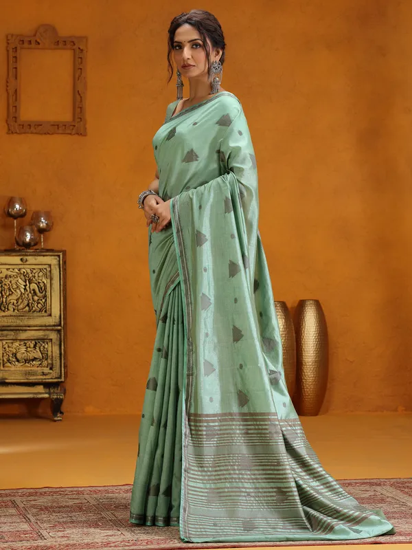 Mint green silk saree with zari weaving