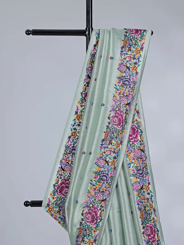 Mint green tissue saree with graceful embroidery