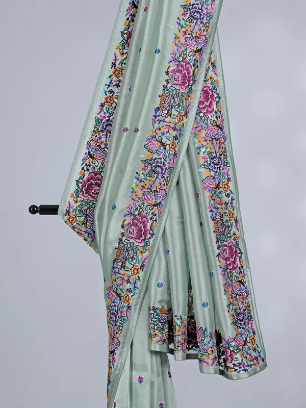 Mint green tissue saree with graceful embroidery