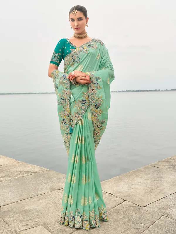 Mint green tissue silk saree with detailing