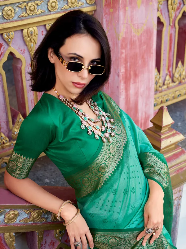 Mint green tussar silk saree with zari prints