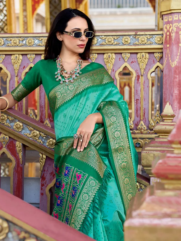 Mint green tussar silk saree with zari prints