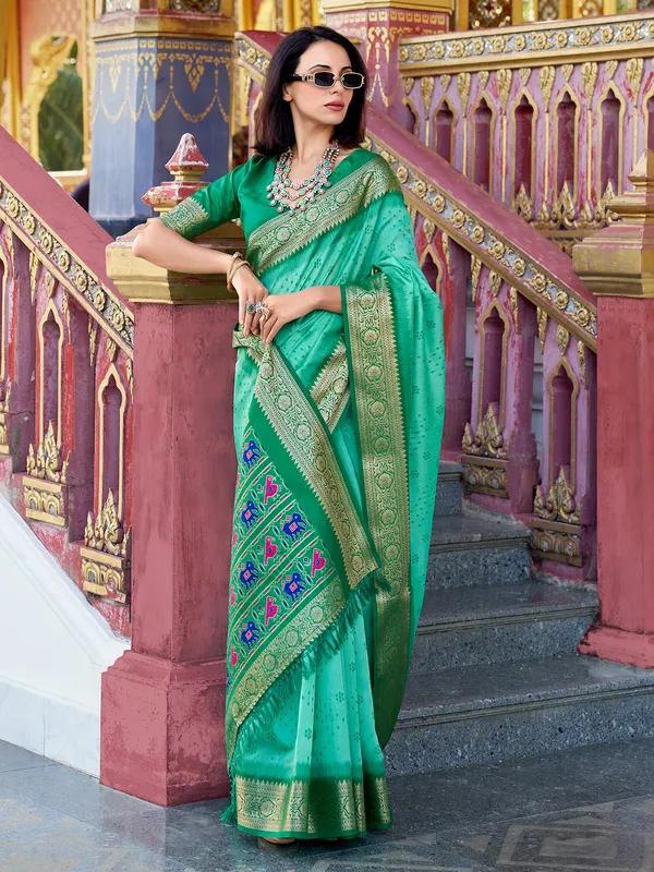 Mint green tussar silk saree with zari prints