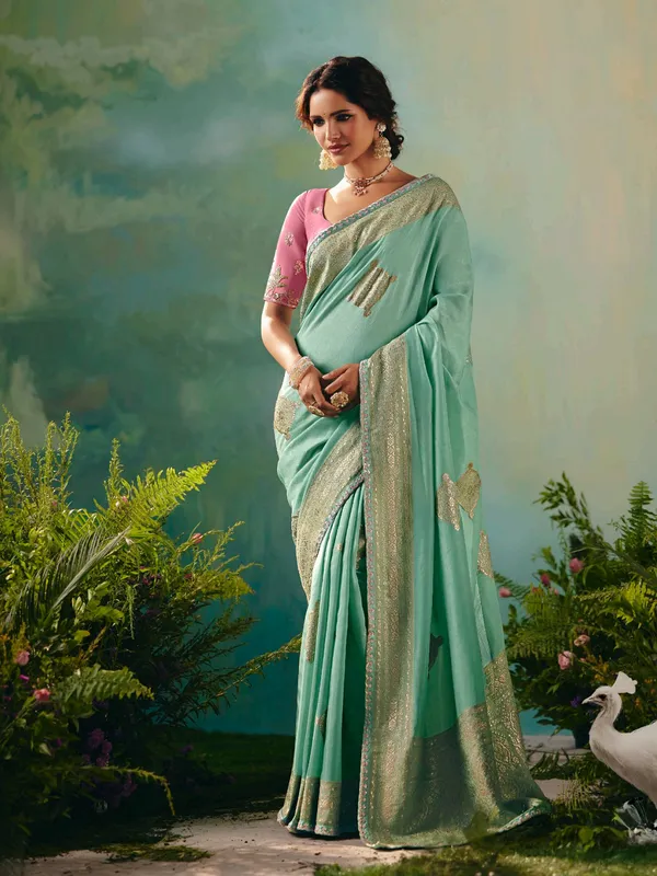 Mint green viscose dola silk wedding wear saree