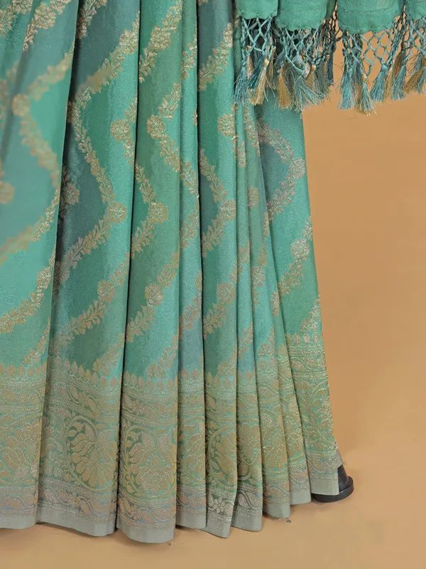 Mint green wedding georgette saree with zari work