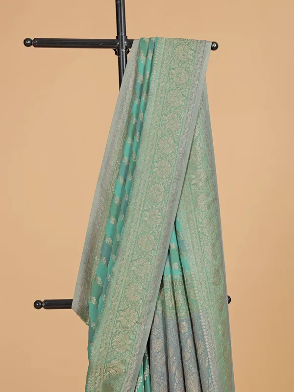 Mint green wedding georgette saree with zari work