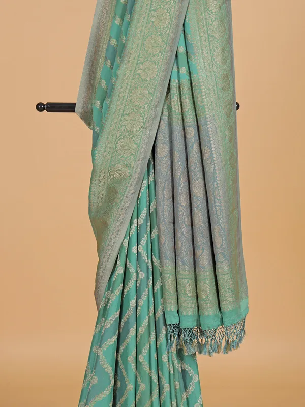 Mint green wedding georgette saree with zari work