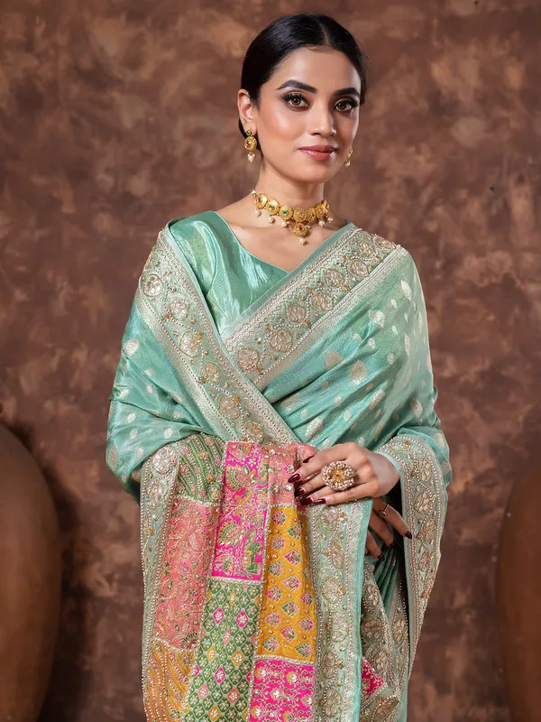 Mint green zari weaving tissue silk saree