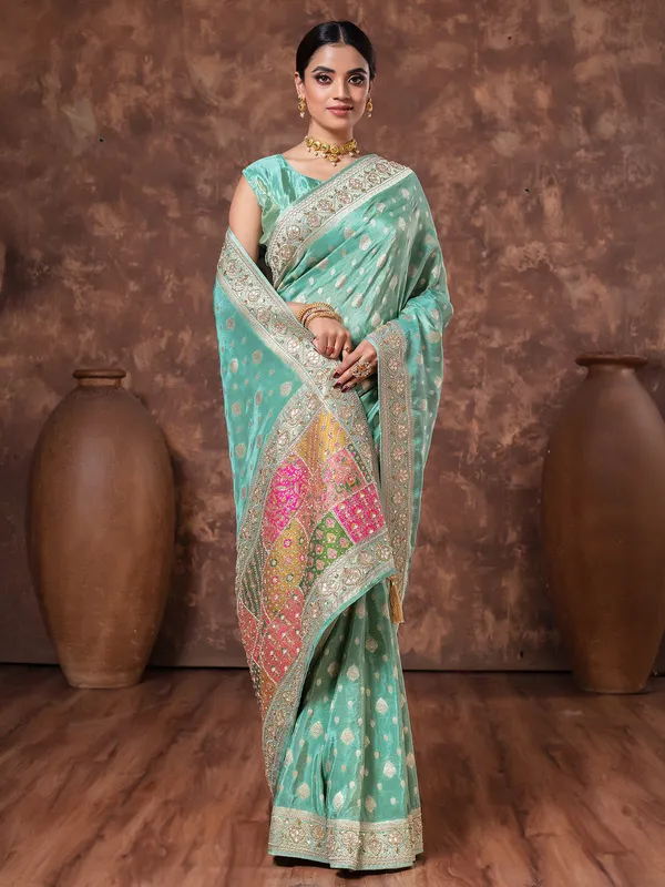 Mint green zari weaving tissue silk saree