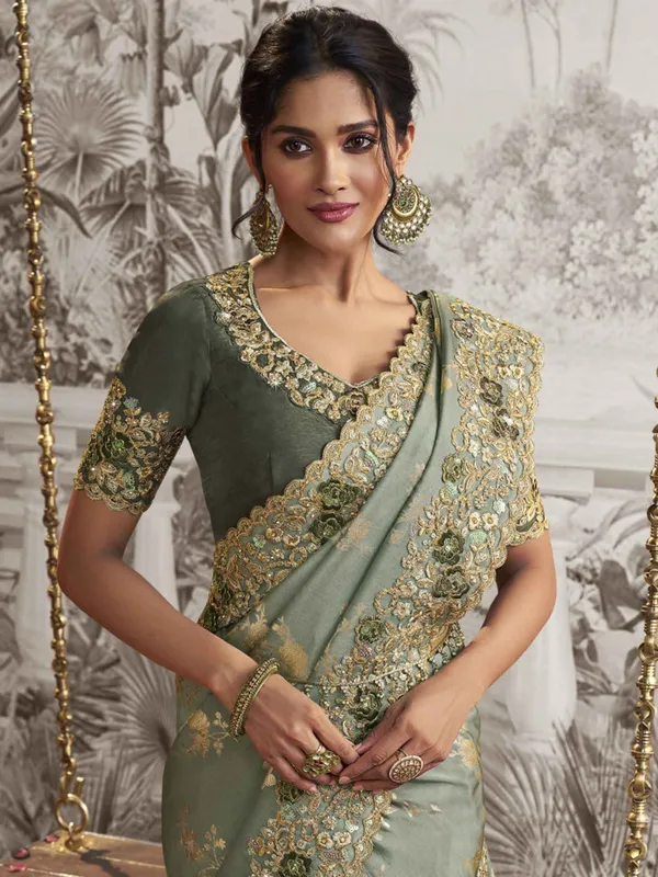 Mint green zari work silk saree